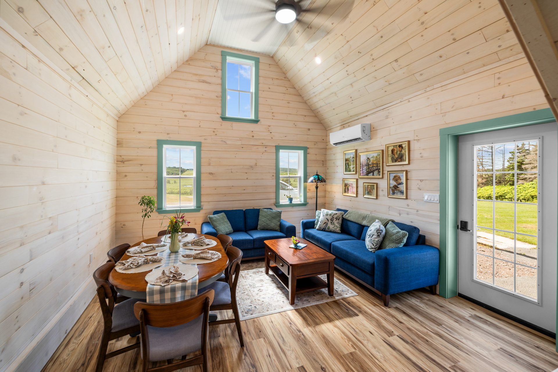 Vaulted living and dining area inside Four Winds Cottage